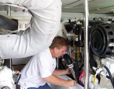 A man working on the inside of an airplane.