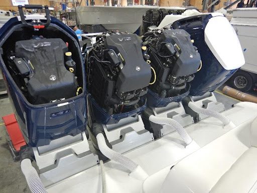 Four motors used on boats in blue color