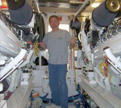 A man standing in the engine room.