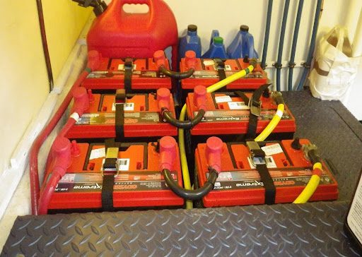 A group of red boxes with yellow straps around them.